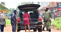 Security personnel check a vehicle heading to Magere, home of Bobi Wine (DAILY MONITOR)