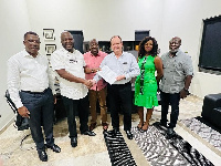 Ibrahim Mahama and officials of Mansour Group during the signing of the deal