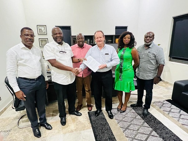 Ibrahim Mahama and officials of Mansour Group during the signing of the deal