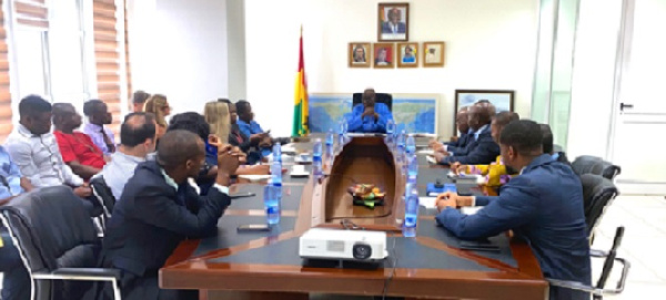 Minister for Aviation, Mr. Joseph Kofi Adda (m) having a discussion with the airline representatives