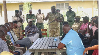 The Kenya Wildlife Service meets with local residents to address human-wildlife conflict in Kajiado