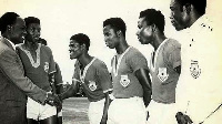 Kwame Nkrumah exchanging pleasantries with some footballers