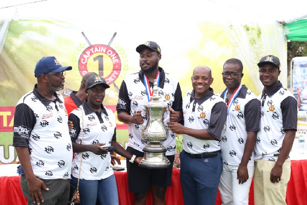 Craig Tandoh(3rd left) receiving his trophy from Mr Appiah