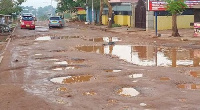 A deplorable road in Adjei Kojo