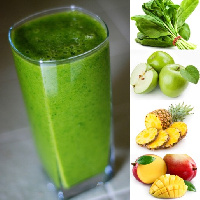 A glass of tropically green smoothie