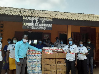 Officials of Delta Paper Mill Ltd presenting PPEs to Kaneshie Bishops 1 and 2 JHS