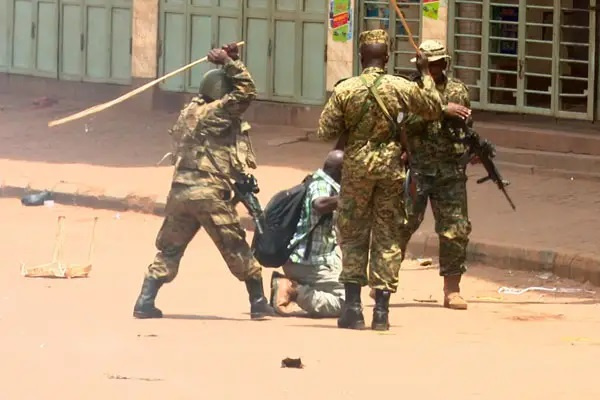 Some officers of the Ghana Armed Forces  flogging residents