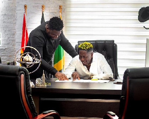 Dancehall musician Shatta Wale and his manager Bulldog