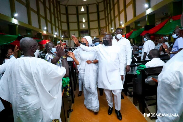 Dr Mahamudu Bawumia and his wife at the 31st night service