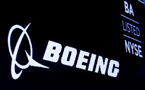 Boeing Co is considering whether to cut or halt production of its grounded 737 MAX