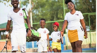 Okyeame Kwame, his wife Annica and kids