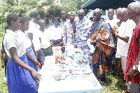 Some dignitaries viewing items made from plastic waste