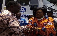 Mr. Samuel Oppong receiving the keys of the trucks