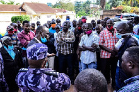 A KCCA official addresses taxi drivers during the registration exercise