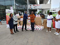 Kenneth Antwi presenting the medical supplies to Ridge Hospital