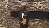 Joe Kingsley Eyiah with his Educational Excellence Award