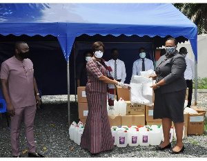 Receiving the items Justice Rtd. Madam Sophia Akuffo(right) and Mrs. Shirley Kokui Agyeman(left)