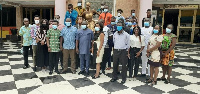 Participants in a group photograph