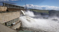 A mini hydro dam produce from five kilowatts to 100 kilowatts of electricity