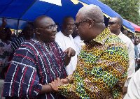 President John Dramani Mahama in a handshake with Dr Bawumia