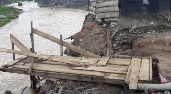 The bridge was washed away by Wednesday night