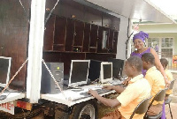 Maame Pokua Sawyerr with the students