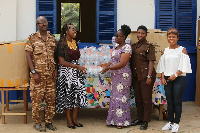 Abena Asomaning - Antwi donating the items to the management of the centers