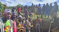 Helpers are trying to rescue people buried by the landslide