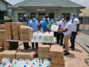 Staff of Kumasi South Regional Hospital taking receipt of the items