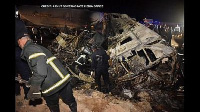 Rescuers at the site of a bus accident in the province of Assiut in Southern Egypt