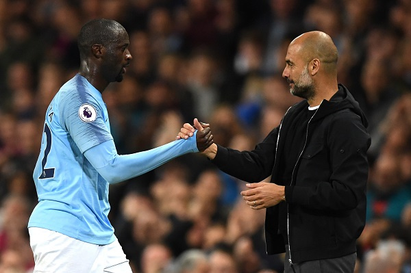 Yaya Toure and Pep Guardiola