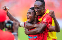 Kotoko’s skipper, Ismail Ganiu with a teammate