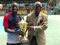 Tennis Professionals of Ghana (TPG) No.2 Samuel Antwi with his trophy