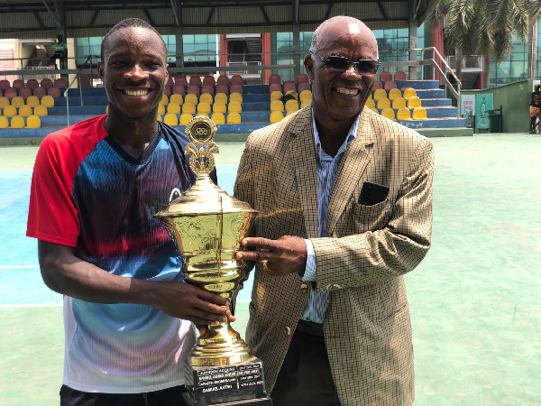 Tennis Professionals of Ghana (TPG) No.2 Samuel Antwi with his trophy