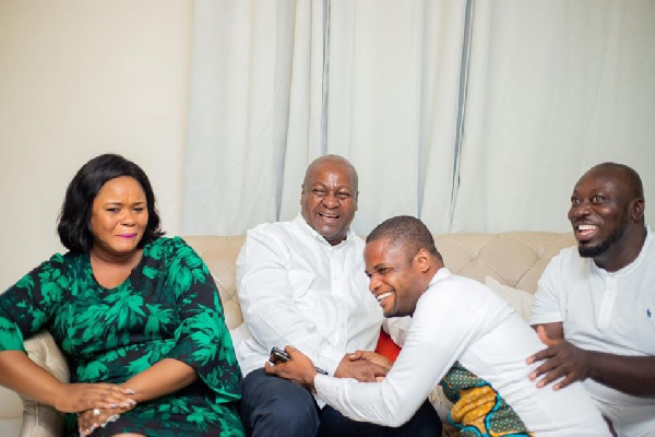 Efo Worlanyo in a picture with Former president John Mahama