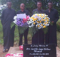 Asamoah Gyan at his mother's grave