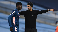 Thomas Partey with Mikel Arteta