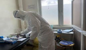 A member of medical staff wearing protective equipment