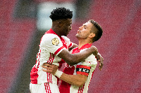 Kudus celebrates with a colleague