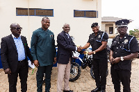 S. L Quartey, presenting the keys to Elvis Sandongo. Emmanuel Quartey