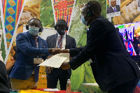 EPA boss Henry Kokofu (left) exchanging an MoU with Mercuria Energy Trading in Glasgow