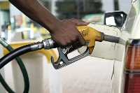 Petrol attendant serving a client | File photo