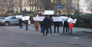 Some Ghanaians demonstrating at St James Square in London