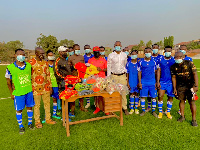 A photo of Cheetah FC's presentation to GIHOC FC