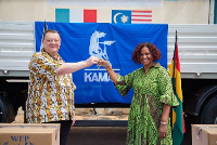 Russian Ambassador to Ghana Dmitry Suslov hands over keys to the cars