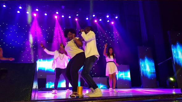 Lydia Forson on stage with Okyeame Kwame