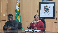 Wode Maya with Zimbabwe's Information Minister at a press conference