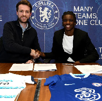 Ato Ampah with a Chelsea official