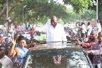 Akufo-Addo and Adwoa Safo interacting with the crowd at the Dome/Kwabenya constituency.