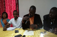 Executive Director NYUPED Prince Hardi Adams [middle] reading statement